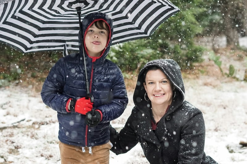 Portillo com crianças: como planejar uma viagem em família para a neve Familia pousando para foto